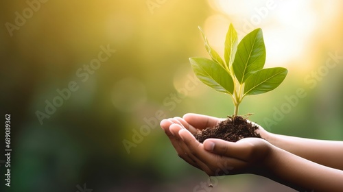 hand children holding young plant with sunlight on green nature background. concept eco earth day, Generative AI photo
