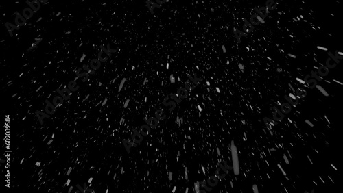 Seamless Loop of Real Snow Falling on a Black Background photo