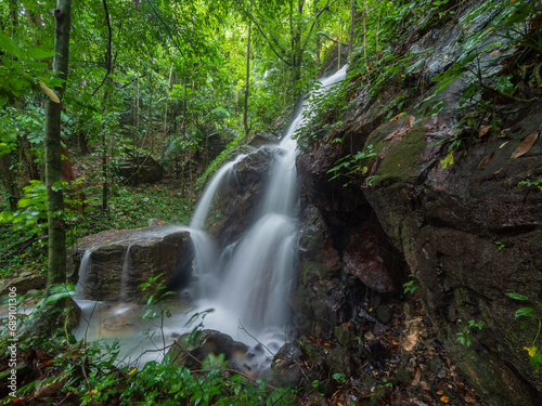 Waterfall in the big forest © saksuvan