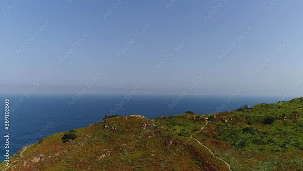 Cliffs and vegetation along the stony shoreline. Cliffs and vegetation along the stony shoreline.