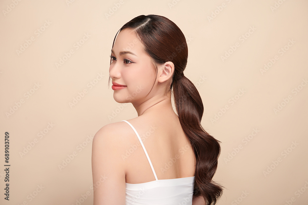 Beautiful young asian woman with clean fresh skin on beige background, Face care, Facial treatment, Cosmetology, beauty and spa, Asian women portrait. Beautiful young asian woman with clean fresh skin on beige background, Face care, Facial treatment, Cosmetology, beauty and spa, Asian women portrait.