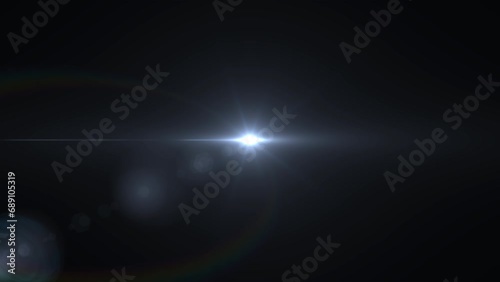 Natural, lens flare on the black background photo