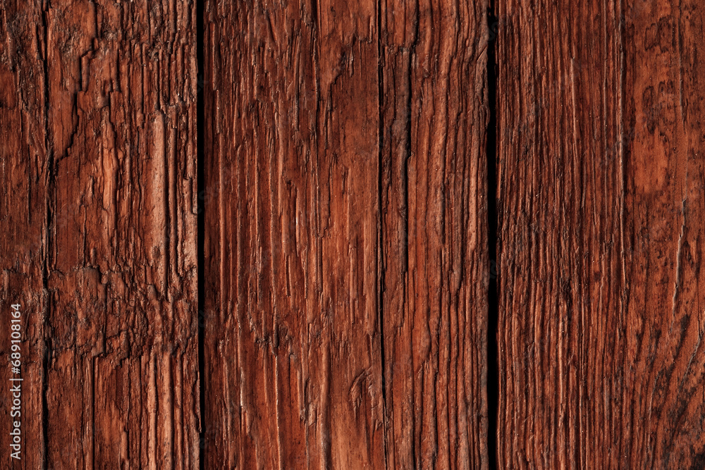 Brown textured wood surface as natural background for your design. Top view with copy space. Brown textured wood surface as natural background for your design. Top view with copy space.