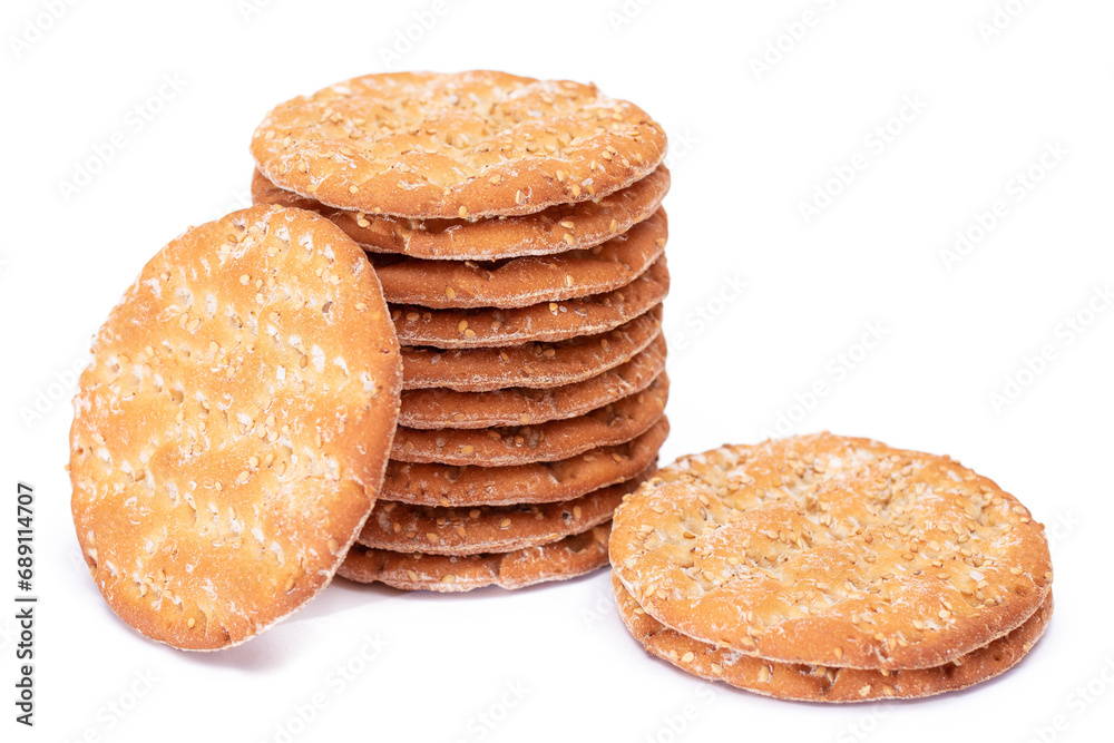 A Stack of Round Salt Crackers with Sesame Isolated on White Background. Dry Snacks - Isolation A Stack of Round Salt Crackers with Sesame Isolated on White Background. Dry Snacks - Isolation
