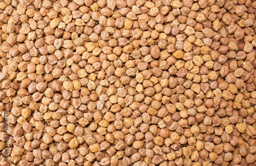 Group of black nutritious chickpeas or black chana full taxture. Top view 