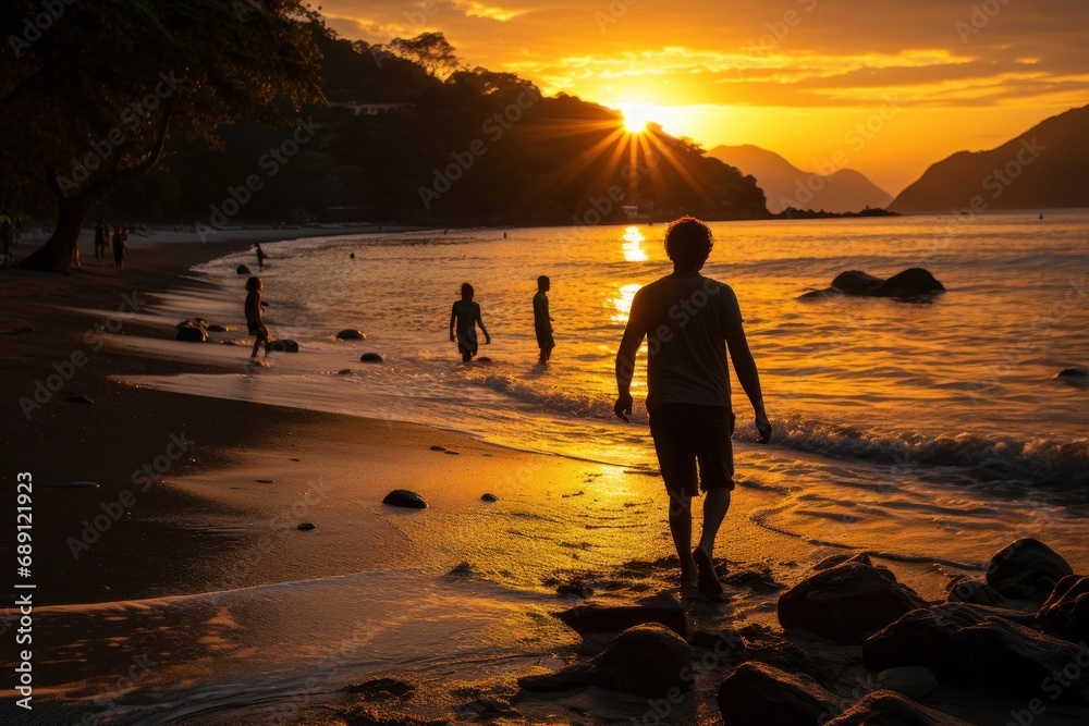 Enjoying summer at the beach of Puerto Galera,  at sunset