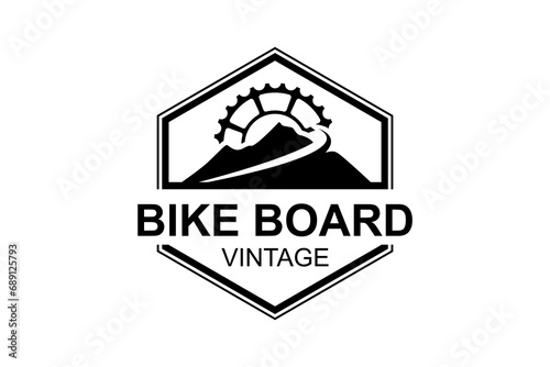 Rocky mountain logo with downhill bike gear elements.