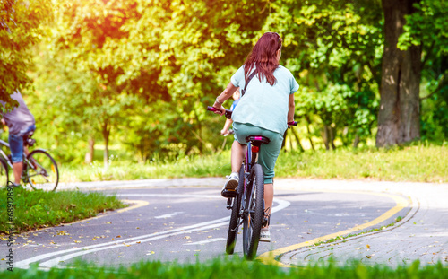 Cyclist ride on the bike path in the city Park 