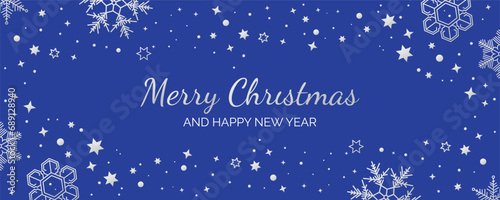 Christmas and New Year greeting card with silver snowflakes isolated on blue
