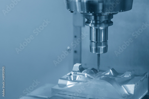 The CNC milling machine cutting mold part by solid ball end mill tool.