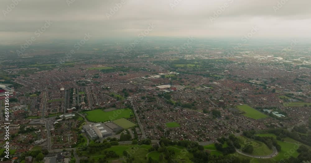 Scenic drone shot of the panoramic beauty of Liverpool's architecture and greenery Scenic drone shot of the panoramic beauty of Liverpool's architecture and greenery