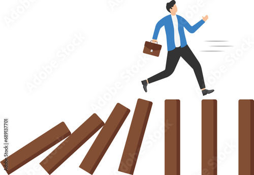 businessman unfortunately pushing dominoes and a businessman running away from falling effect.

