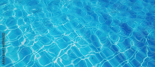 Bird s eye view of pool with rippling blue water Copy space image Place for adding text or design
