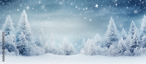 Design of a wintery card featuring stunning snow and fir tree scenery Copy space image Place for adding text or design © vxnaghiyev