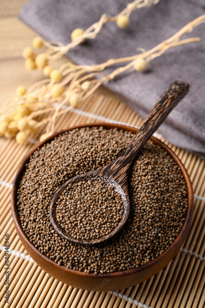 Φωτογραφία Perilla seed in bowl with spoon, Healthy herbal seed ingredients in Asian food