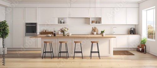 Modern bright kitchen in a new house featuring white furniture and a bar with wooden floors and accents Copy space image Place for adding text or design photo