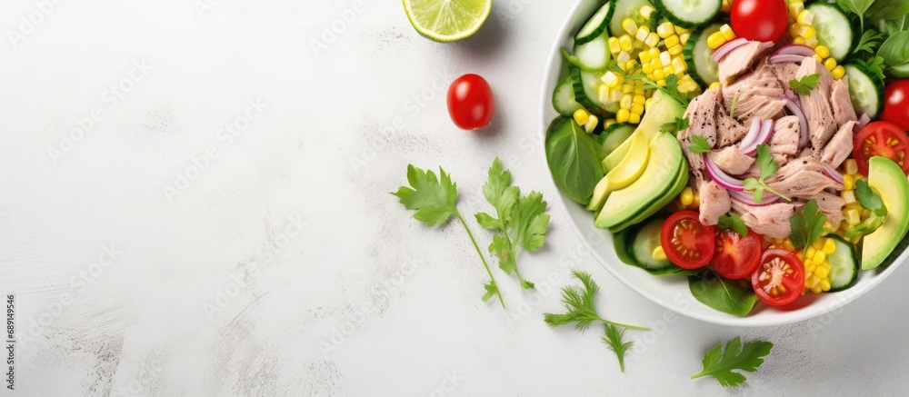 Healthy ketogenic dish Avocado and tuna salad with fresh vegetables Copy space image Place for adding text or design - obrazy, fototapety, plakaty 