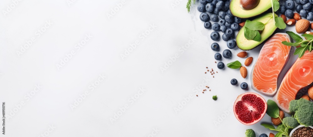 Choosing nutritious food Clean eating idea Cook with fish superfoods veggies artichokes Brussels sprouts fruits legumes and blueberries Overhead view for panoramic banner Copy space image Place - obrazy, fototapety, plakaty 