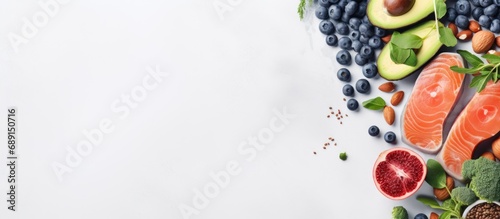 Choosing nutritious food Clean eating idea Cook with fish superfoods veggies artichokes Brussels sprouts fruits legumes and blueberries Overhead view for panoramic banner Copy space image Place photo