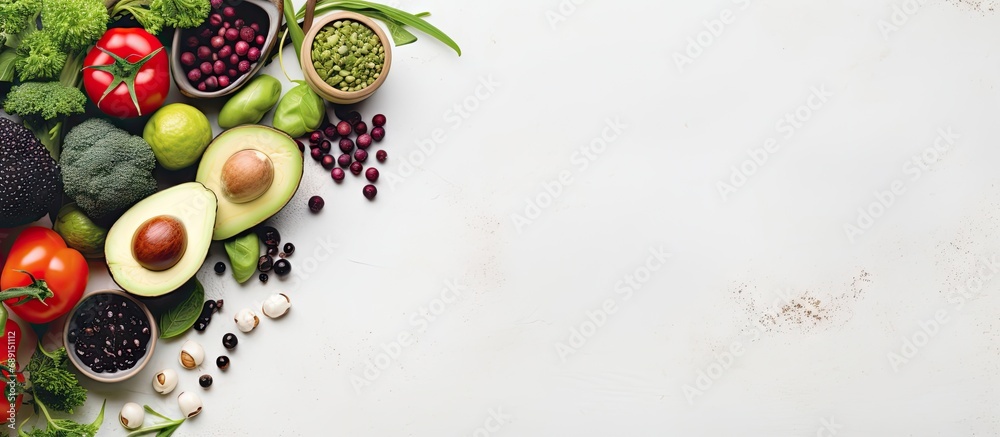 Healthy food options including vegetarian and vegan choices such as vegetables fruits seeds legumes and leafy greens on a light background Copy space image Place for adding text or design