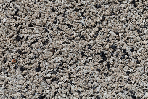 Crushed granite stones wall - close up