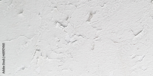 Beautiful white cement wall plastered surface background pattern. Clean white wall advertising backdrop. Concrete white wall. Seamless cracked off white stone smooth wall texture. 