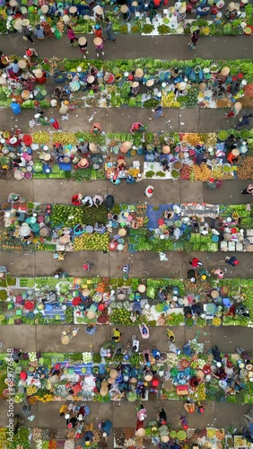 Top view of colorful local outdoor farmers market in rural Vietnam. photo