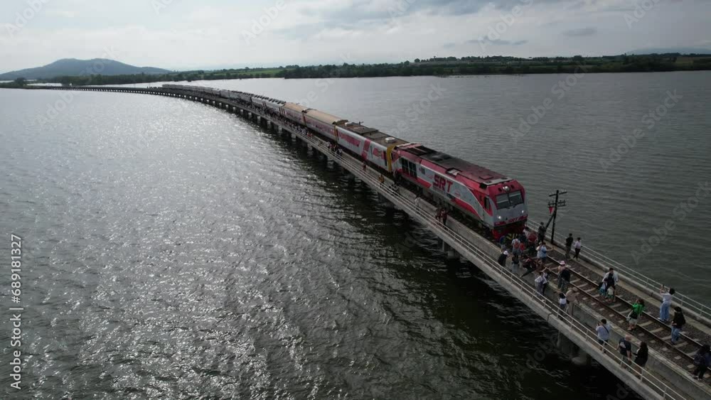 Aerial view of the floating train in Pasak Chonlasit Dam, Lopburi, Thailand Aerial view of the floating train in Pasak Chonlasit Dam, Lopburi, Thailand