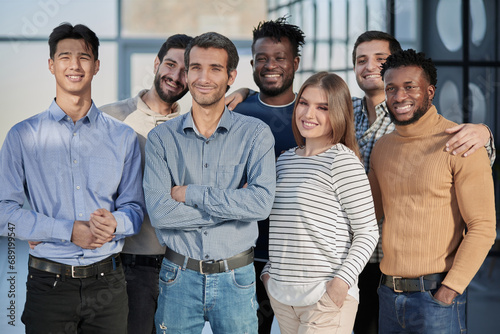 Successful business team smiling while standing in the office