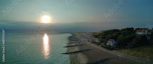 Sunrise over the sea Whitstable Bay Beach Huts