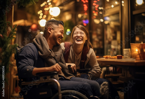 happy couple with a wheelchair,Disabilities-specific content © studiogo