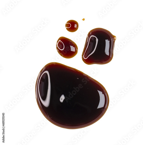 Drops of liquid brown sauce unagi, soy isolated on white, clipping path, PNG photo