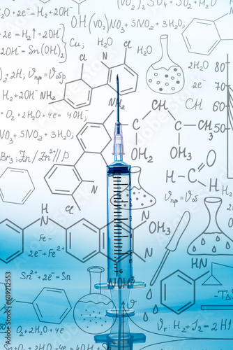 Macro syringe,A 5ml syringe and needle isolated on a white background with detailed clipping path,Close up of a syringe. Focus on numbers photo