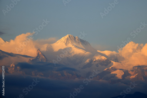 Lamjung Himal located in Annapurna mountain range in Nepal during afterglow photo