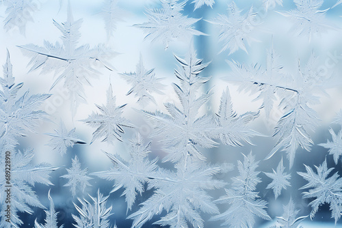 Intricate ice crystals forming delicate frost patterns on a window - showcasing the natural art of a cold weather phenomenon - with each design unique and captivating.