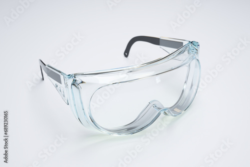 Clear Protective Safety Glasses Isolated on a Pristine White Background photo