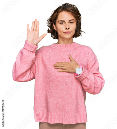 Young hispanic woman wearing casual clothes swearing with hand on chest and open palm, making a loyalty promise oath