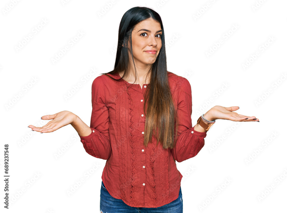 Young hispanic woman wearing casual clothes clueless and confused expression with arms and hands raised. doubt concept. Young hispanic woman wearing casual clothes clueless and confused expression with arms and hands raised. doubt concept.