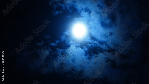 The moon night view with the full moon and clouds in the sky © Bo