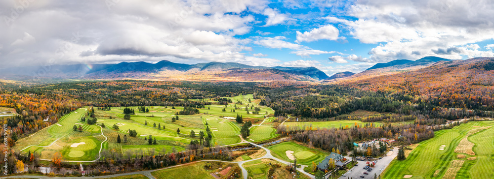Aerial panorama of Presidential Range covered in clouds, in Bretton Woods, White Mountain National Forest, New Hampshire. - obrazy, fototapety, plakaty 