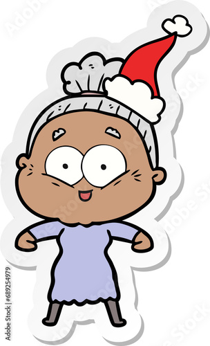 hand drawn sticker cartoon of a happy old woman wearing santa hat