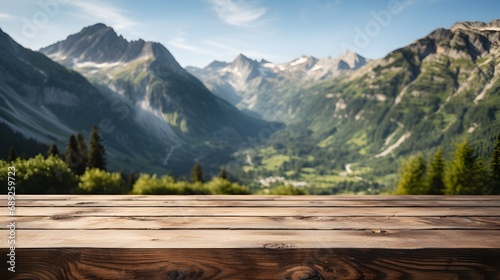 Majestic mountain landscape with wooden foreground.