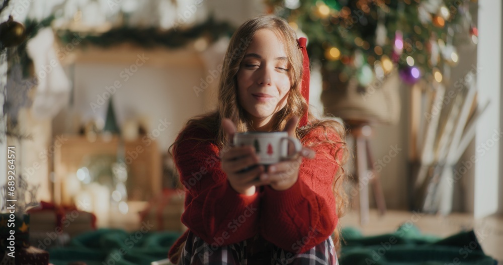 Portrait Of Woman Holding Cup Of Hot Coffee Enjoying Christmas Holidays
