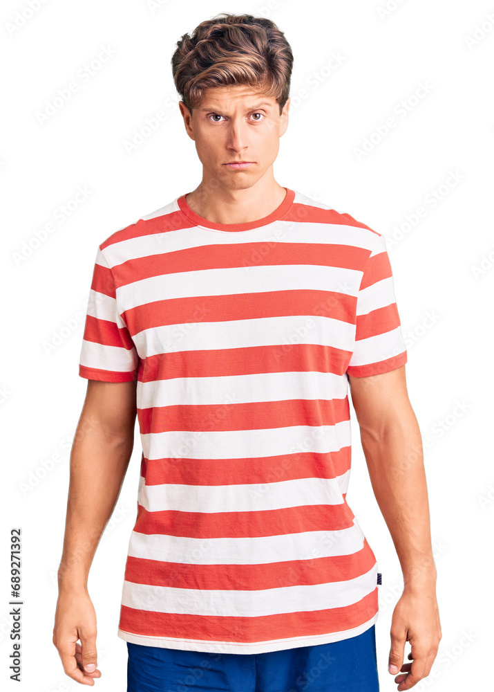 Young handsome man wearing casual clothes skeptic and nervous, frowning upset because of problem. negative person. Young handsome man wearing casual clothes skeptic and nervous, frowning upset because of problem. negative person.