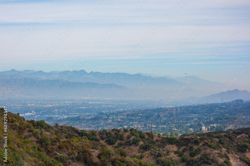 Views from Dirt Mullholland Dr in the Santa Monica Mountians looking North in the San Fernando Valley on a clear sky winter day. Views from Dirt Mullholland Dr in the Santa Monica Mountians looking North in the San Fernando Valley on a clear sky winter day.