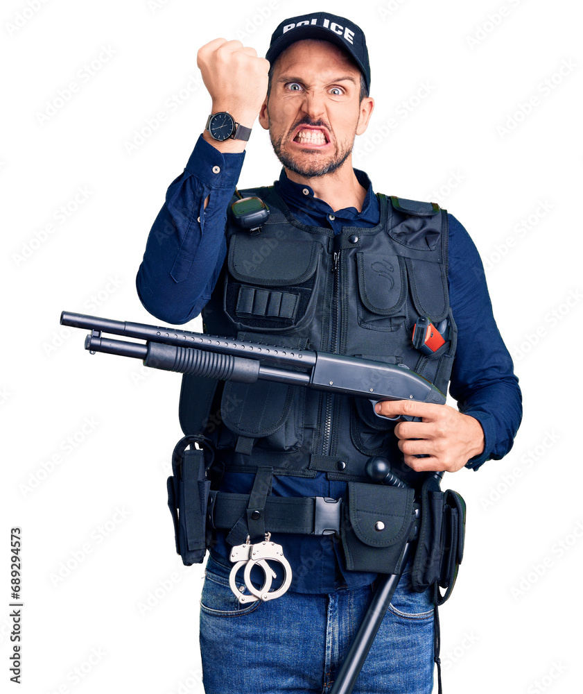 Young handsome man wearing police uniform holding shotgun annoyed and frustrated shouting with anger, yelling crazy with anger and hand raised Young handsome man wearing police uniform holding shotgun annoyed and frustrated shouting with anger, yelling crazy with anger and hand raised