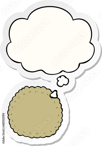 cartoon biscuit with thought bubble as a printed sticker