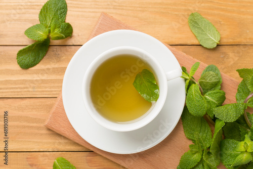 Fresh mint tea on wooden background,top view