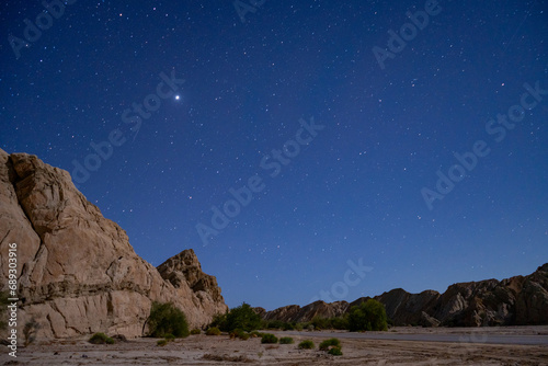 Starry sky photographs taken from inside a canyon in the Mojave Desert of Southern California. photo