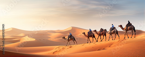 Cammels in dessert. Camel animals walking through a hot desert full of sand © Alena